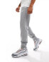 Фото #1 товара Nike Club Knit joggers in grey