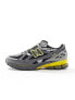 Фото #18 товара New Balance 1906 trainers in dark grey and yellow