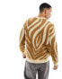 ASOS DESIGN relaxed knitted fluffy jumper in brown animal print