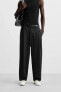 RELAXED FIT PLEATED TROUSERS