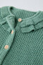 Interlock knit cardigan with neck detail