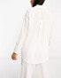 The Frolic tourmaline shirred long sleeve shirt beach co-ord in white pleated texture