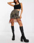 Фото #1 товара Reclaimed Vintage asymmetric hem midi skirt in multi animal print