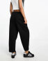 ASOS DESIGN Petite tapered trouser with turn up hem in black