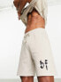 Фото #3 товара ASOS Dark Future co-ord relaxed short with gothic logo in beige