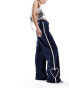 Monki heart stripe straight leg track pant trouser in navy and white