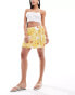 Фото #1 товара ASOS DESIGN tie waist skort in yellow floral print