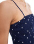 Wednesday's Girl polka dot smocked jumpsuit in navy and cream