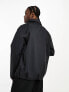 New Balance Athletics State Coaches Jacket in charcoal