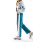 Tommy Jeans co-ord varsity sport track pants in teal