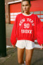 Slogan sweatshirt with ribbed neck