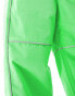 The North Face Tek woven joggers with reflective piping in bright green