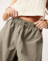 Фото #4 товара ASOS EDITION drawstring wide leg trouser with cargo pocket in khaki