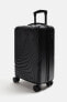 Rigid carry-on suitcase