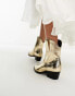 Glamorous western ankle boots in gold metallic