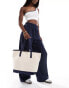 Фото #1 товара ASOS DESIGN canvas tote bag with contrast detail in navy blue