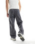 ASOS DESIGN panelled piping trouser in grey and white sheen nylon