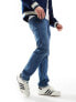 Фото #11 товара Levi's 502 taper fit jeans in mid blue