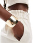 Фото #1 товара ASOS DESIGN cuff bracelet with curved detail in brushed gold tone