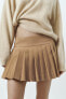 Box pleat skort