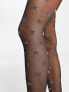 ASOS DESIGN 30 denier glitter star tights in black and silver