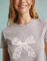 Miss Selfridge short sleeve baby tee with lace bow graphic in grey