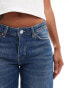 Weekday Ample low waist baggy fit jeans in streaky blue wash