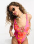 Фото #1 товара Reclaimed Vintage tie front swimsuit in pink and orange floral print