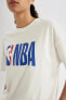 DeFactoFit NBA Wordmark Oversize Fit Bisiklet Yaka Baskılı Kısa Kollu Tişört T5506AZ24SM