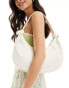 Glamorous knotted oversized shoulder bag in cream patent