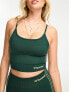 Hummel Strappy sports crop top with low back in dark green