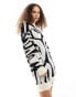 Фото #1 товара Monki oversized knitted mini dress in mono swirl pattern jacquard