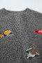Knit sweater with embroidered cars