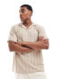 ASOS DESIGN relaxed polo with revere collar in beige textured stripe