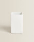 White earthenware toothbrush holder