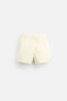 BUTTONED SHORT SWIMMING TRUNKS