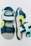 Technical sandals with hook-and-loop straps