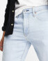 Фото #4 товара Levi's 512 slim taper fit jeans in light blue wash with knee rip