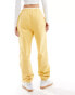 ASOS DESIGN sweat joggers with cuff in yellow