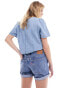 Фото #6 товара Levi's 501 rolled denim shorts in blue wash