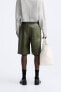 Leather effect cargo bermuda shorts