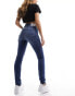 Фото #2 товара Calvin Klein Jeans high rise skinny jeans in mid wash