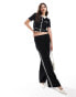 Фото #1 товара Mango knitted straight leg side stripe co-ord trousers in black