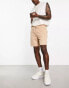 ASOS DESIGN slim shorts in beige quilted texture