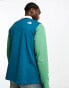 The North Face Rugby heavyweight polo in blue and green Exclusive at ASOS