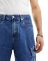 Фото #8 товара Calvin Klein Jeans 90s loose cargo denim shorts in mid wash