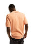 Levi's knitted polo shirt with small logo in orange