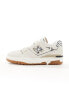 New Balance 550 trainers in sea salt and leopard