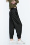 Barrel trousers with cuffed hems