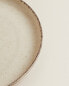 Porcelain dessert plate with antique finish rim